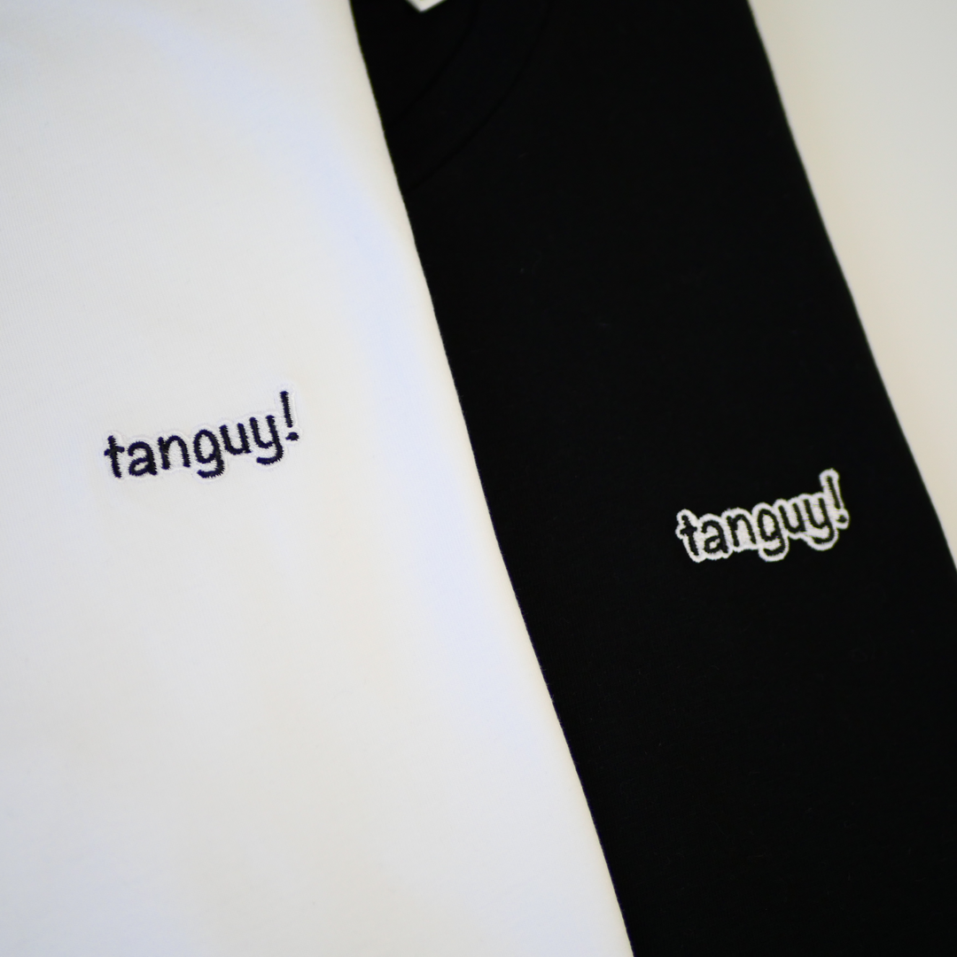 タンギアーツ - 白と黒のヴィーガンTシャツ